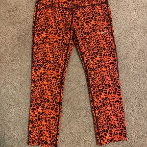 Nike Orange Cheetah Print Cropped Leggings